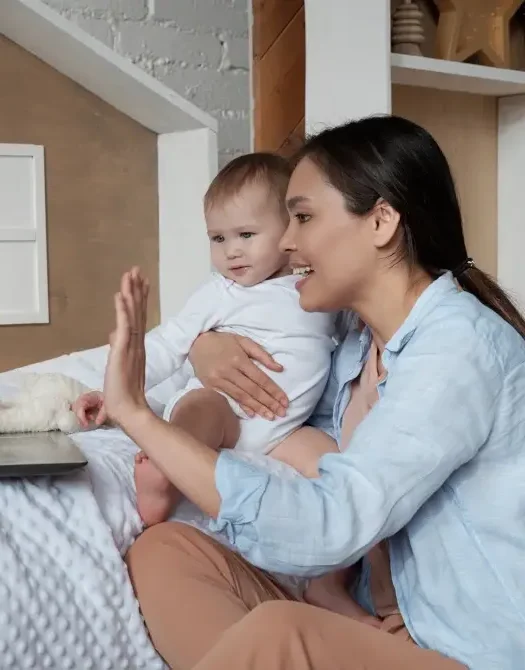 mother-with-baby-in-online-therapy-session-with-perinatal-anxiety-ocd-specialist