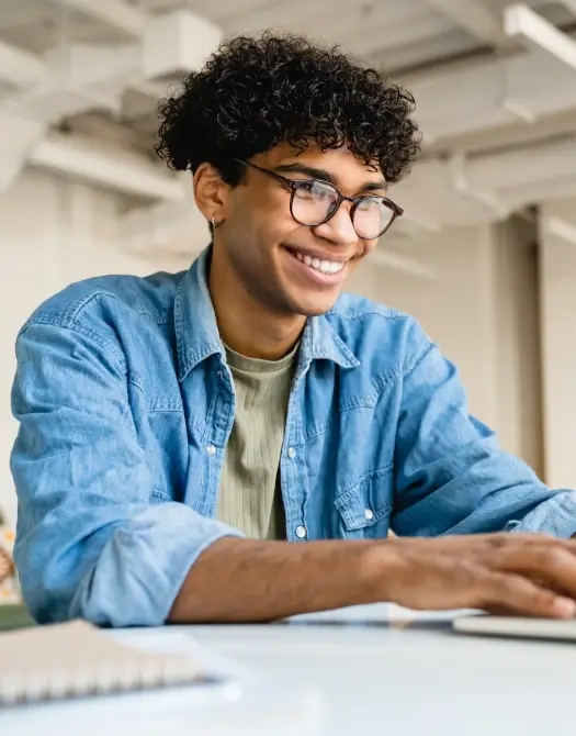 young-black-man-happy-while-in-an-online-therapy-session