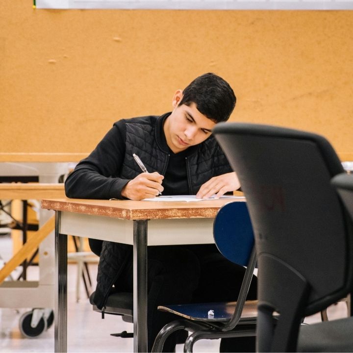 College student studying independently to manage ADHD in class.